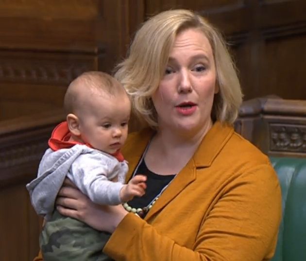 Labour MP Stella Creasy holds her baby daughter in the Commons 