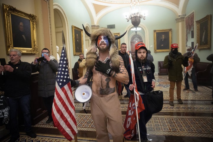 A pro-Trump mob confronts U.S. Capitol police outside the Senate chamber of the U.S. Capitol Building on Jan. 6 in Washington, D.C.