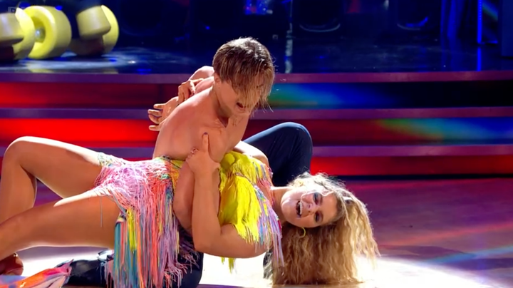 strictly come dancing pro nikita kuzmin suffers wardrobe malfunction as he ditches shirt during dance off huffpost uk entertainment