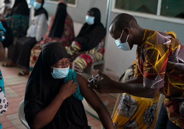 A health worker administers a dose of the Johnson & Johnson COVID-19 vaccine at the Bundung Maternal...