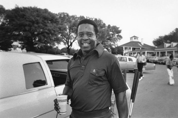 Lee Elder is seen arriving at the Masters golf course to play practice round in Augusta, Ga., on April 10, 1975.