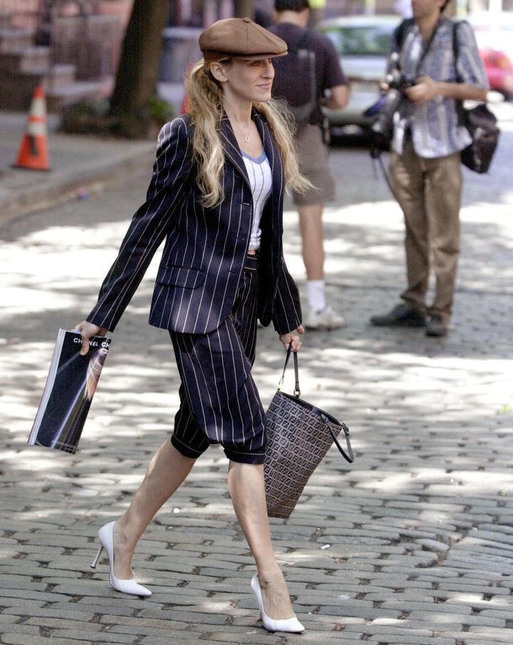 Parker wears a newsboy suit while filming "Sex and the City" in New York in May 2001.