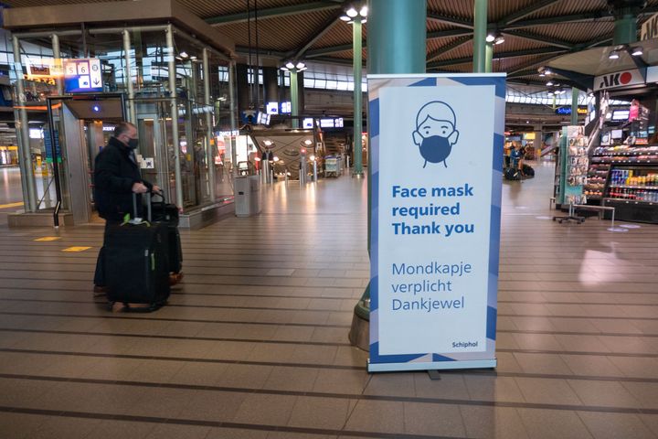 Dutch health officials on Tuesday said the omicron variant was found in coronavirus samples taken before South Africa reported the new variant to the WHO last week. The Amsterdam Airport Schiphol is pictured. 