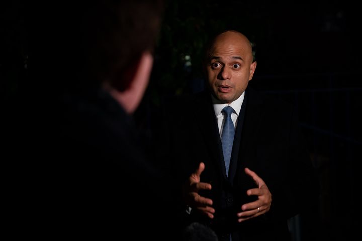 Sajid Javid speaks to the media following a visit to Abbey vaccine centre in central London.