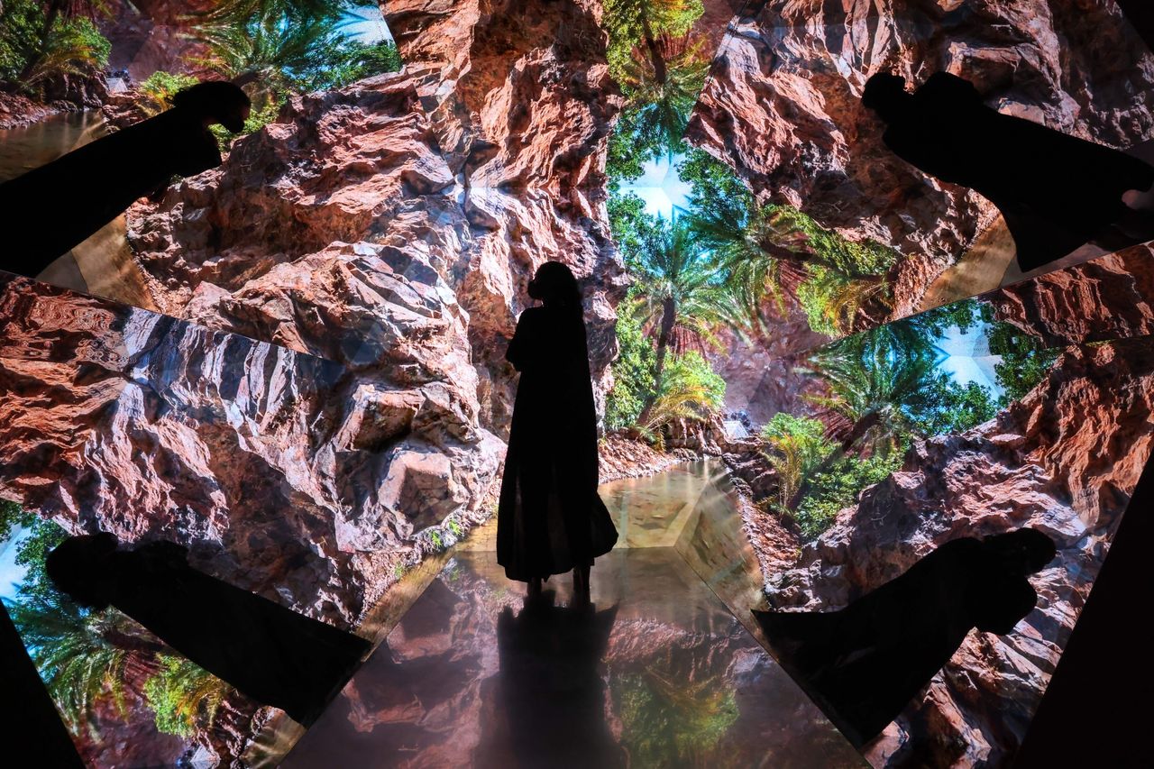 A woman looks at a video installation at the Expo 2020 in the Gulf Emirate of Dubai on Wednesday.