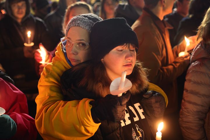 People Attend A Downtown Vigil To Commemorate Those Killed And Injured In The Recent Oxford High School Shooting On December 3, 2021 In Oxford, Michigan.