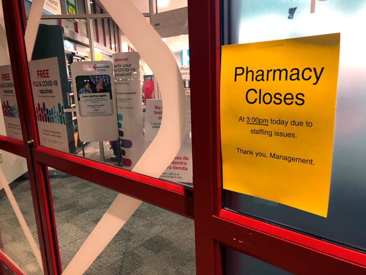 A sign posted outside a CVS pharmacy in Indianapolis.