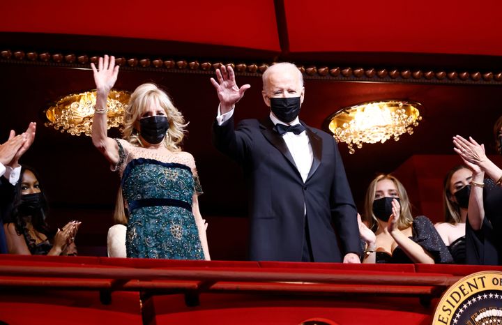 Jill Biden and Joe Biden acknowledge the crowd at the 44th Kennedy Center Honors.