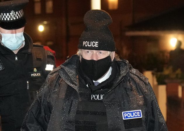 Boris Johnson observes an early morning Merseyside Police raid as part of 'Operation Toxic' to infiltrate County Lines drug dealings