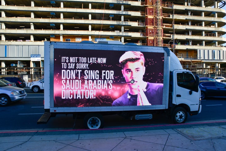 Mobile billboards urging Justin Bieber to cancel his upcoming concert in Saudi Arabia near the Microsoft Theater on Nov. 21, in Los Angeles, California.