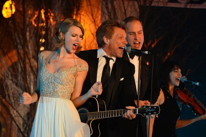 Taylor Swift, Jon Bon Jovi and the Duke of Cambridge perform during the Winter Whites Gala on Nov. 26, 2013, in London.
