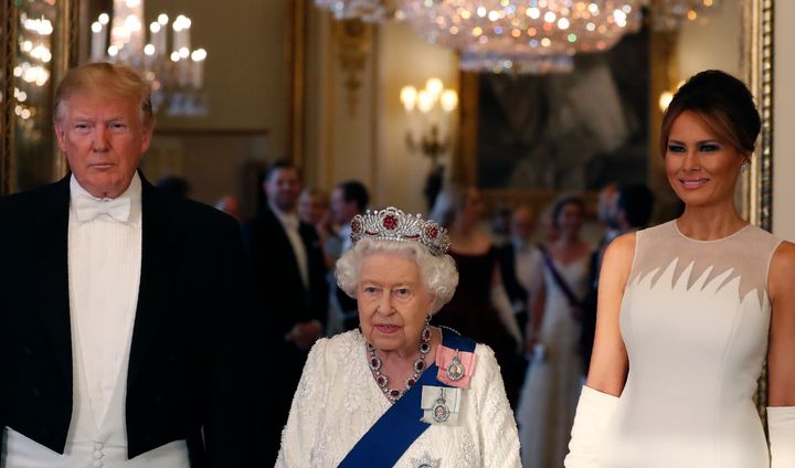 Queen Elizabeth poses for a photo with then-President Donald Trump and then-first lady Melania Trump ahead of a State Banquet at Buckingham Palace on June 3, 2019, in London.