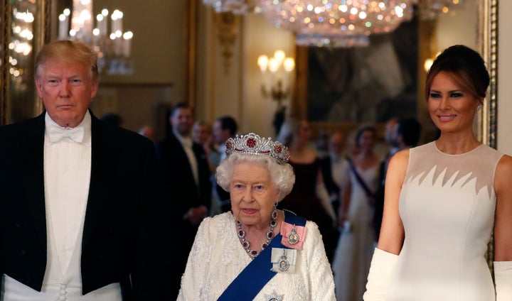 Queen Elizabeth poses for a photo with then-President Donald Trump and then-first lady Melania Trump ahead of a State Banquet at Buckingham Palace on June 3, 2019, in London.