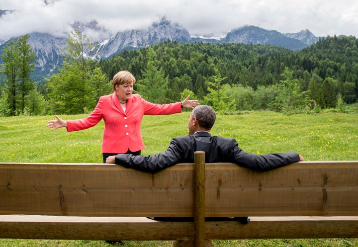 German Chancellor Angela Merkel speaks with U.S. President Barack Obama at Schloss Elmau hotel near Garmisch-Partenkirchen, Germany, during the G-7 summit, on June 8, 2015.
