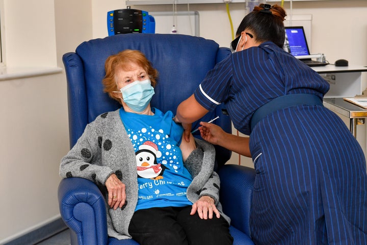 Margaret Keenan becoming the first patient in the United Kingdom to receive the Pfizer/BioNtech covid-19 vaccine in December 2020. 