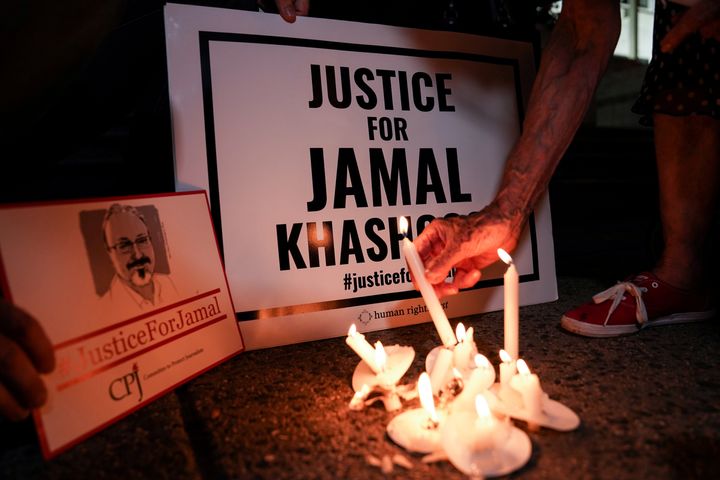 The Committee to Protect Journalists and other press freedom activists hold a candlelight vigil in front of the Saudi Embassy where Khashoggi died during a memorial event in 2019.
