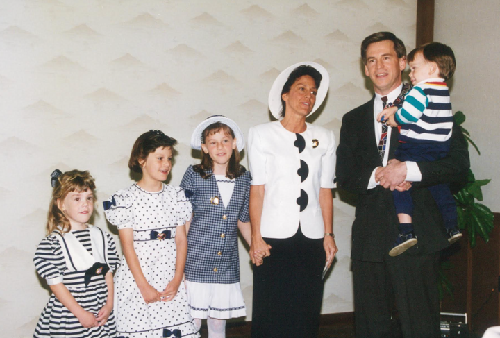The author as a child (third from left) with her family, singing at her grandparents' anniversary party.