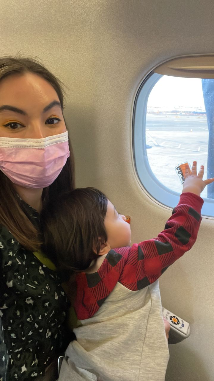 Blogger Lina Forrestal and her son Archie on a flight from New Jersey to Florida.