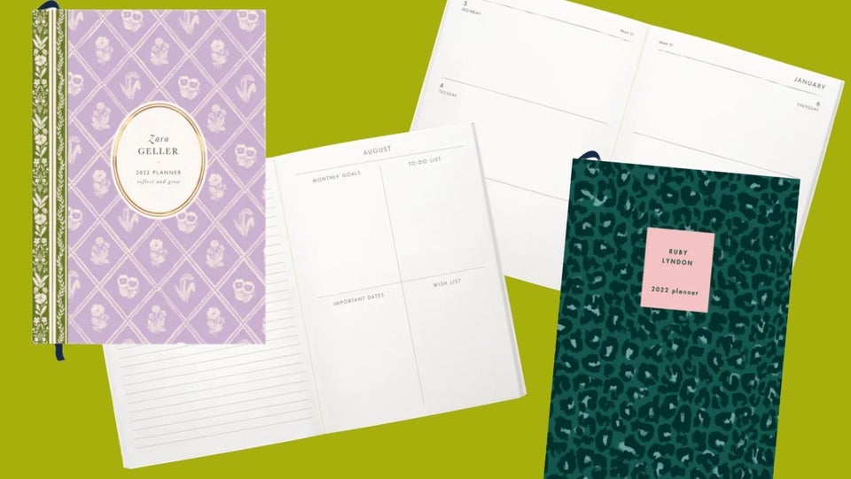 A hardcover planner with weekly and monthly overviews