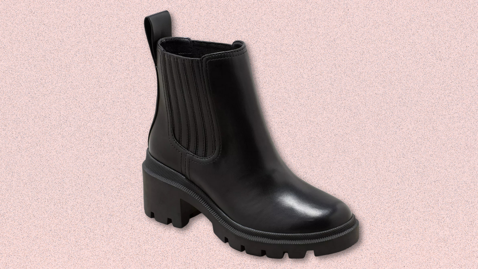 A pair of heeled lug sole boots