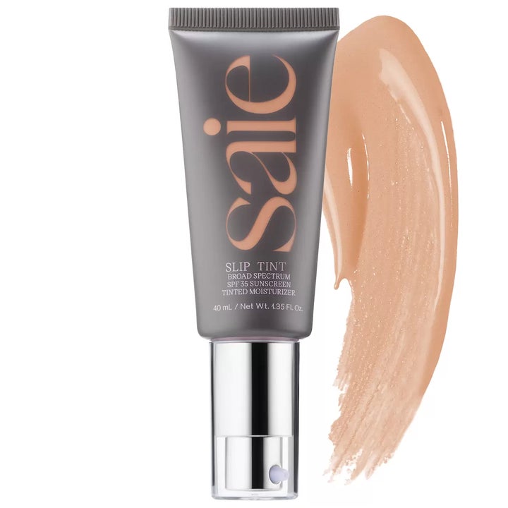 <a href="https://go.skimresources.com/?id=38395X987171&xs=1&xcust=bestbeauty2021-KristenAiken-120821-&url=https%3A%2F%2Fwww.sephora.com%2Fproduct%2Fsaie-slip-tint-dewy-tinted-moisturizer-spf-35-sunscreen-P468210%3Fcountry_switch%3Dus%26lang%3Den%26skuId%3D2413953%26om_mmc%3Dppc-GG_1918213323_116802998109_pla-1161910632883_2413953_496387856348_9067609_c%26ds_rl%3D1261471%26gclid%3DCj0KCQiAzMGNBhCyARIsANpUkzOY34LwRUjd2ZABmp--DFdo3e0NVf20e9L8UxLcJQrjs3tdcTH4jWYaAq2HEALw_wcB%26gclsrc%3Daw.ds" target="_blank" role="link" rel="sponsored" class=" js-entry-link cet-external-link" data-vars-item-name="Saie Slip Tint" data-vars-item-type="text" data-vars-unit-name="61b16ffee4b04ae319fa3d7a" data-vars-unit-type="buzz_body" data-vars-target-content-id="https://go.skimresources.com/?id=38395X987171&xs=1&xcust=bestbeauty2021-KristenAiken-120821-&url=https%3A%2F%2Fwww.sephora.com%2Fproduct%2Fsaie-slip-tint-dewy-tinted-moisturizer-spf-35-sunscreen-P468210%3Fcountry_switch%3Dus%26lang%3Den%26skuId%3D2413953%26om_mmc%3Dppc-GG_1918213323_116802998109_pla-1161910632883_2413953_496387856348_9067609_c%26ds_rl%3D1261471%26gclid%3DCj0KCQiAzMGNBhCyARIsANpUkzOY34LwRUjd2ZABmp--DFdo3e0NVf20e9L8UxLcJQrjs3tdcTH4jWYaAq2HEALw_wcB%26gclsrc%3Daw.ds" data-vars-target-content-type="url" data-vars-type="web_external_link" data-vars-subunit-name="article_body" data-vars-subunit-type="component" data-vars-position-in-subunit="25">Saie Slip Tint</a>