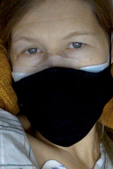 The author "alone, scared and heartbroken" in the ICU recovering from severe hemorrhaging.