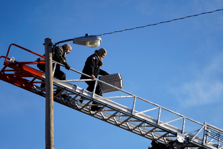 The cat went missing earlier this week and was first spotted atop the pole on Wednesday.