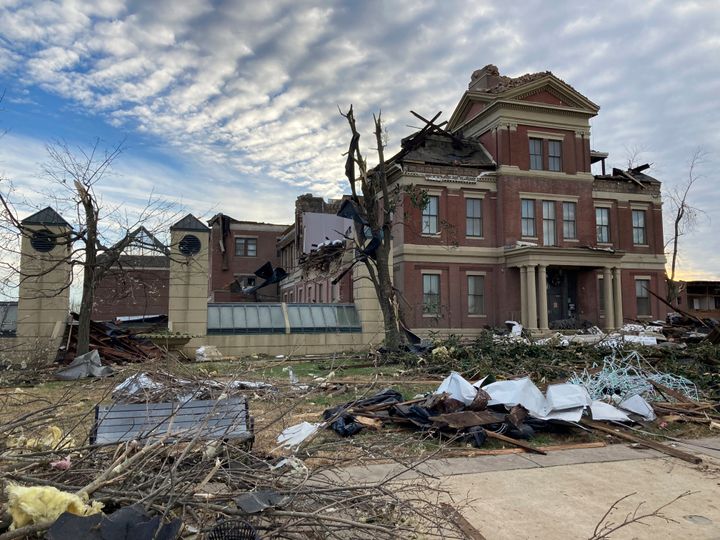 Debris surrounds the damaged Graves County courthouse in Mayfield, Ky., on Saturday, Dec. 11, 2021. Rescuers combed through fields of wreckage after a tornado outbreak roared across the middle of the U.S., leaving dozens dead and communities in despair. (AP Photo/Dylan T. Lovan)