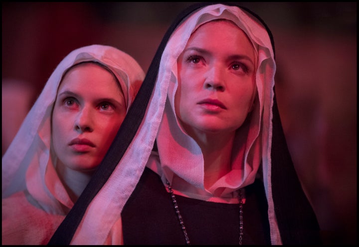 Daphne Patakia, left, as Bartolomea and Virginie Efira as Benedetta in Paul Verhoeven’s "Benedetta."