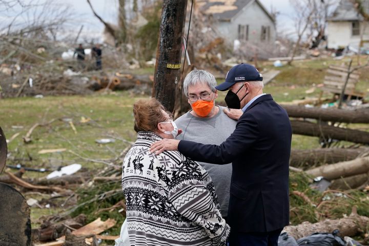 President Joe Biden speaks to tornado survivors as he surveys storm damage in Dawson Springs, Kentucky on Wednesday.