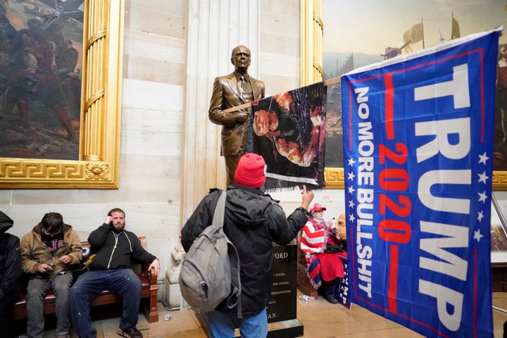 Protesters gather storm the Capitol and halt a joint session of the 117th Congress on Wednesday, Jan. 6 in Washington, D.C.