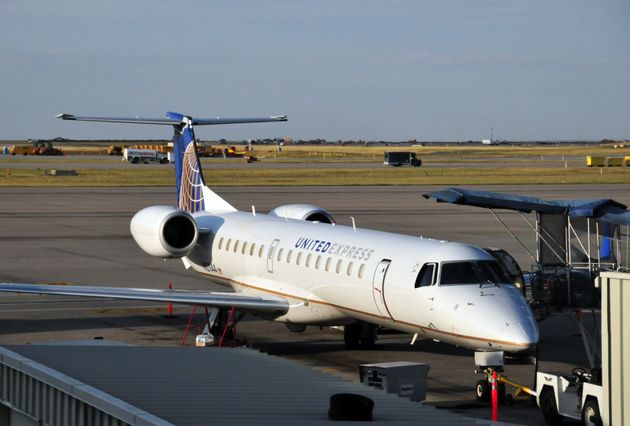 Denver, Colorado, USA: United Express (Star Alliance) regional jet, CommutAir N21144 (Embraer ERJ-145XR...