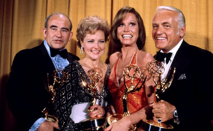 Edward Asner, Betty White, Mary Tyler Moore and Ted Knight holding their Emmy awards for “The Mary Tyler Moore Show” in 1976.