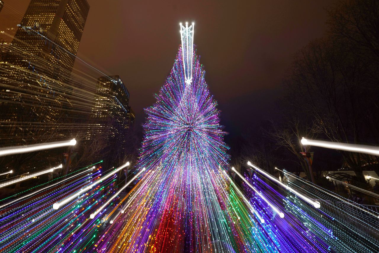 The Millennium Park Christmas tree is seen in a timed exposure with zoom lens Wednesday in Chicago. 