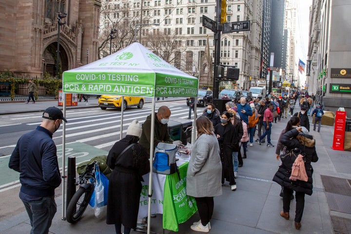 New Yorkers line up for COVID-19 tests on Wall Street on Thursday.