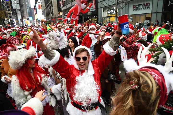 Partiers dressed up for SantaCon on Dec. 11. The annual event (which was canceled last year) is thought to be one of the reasons for the recent COVID surge in New York City.
