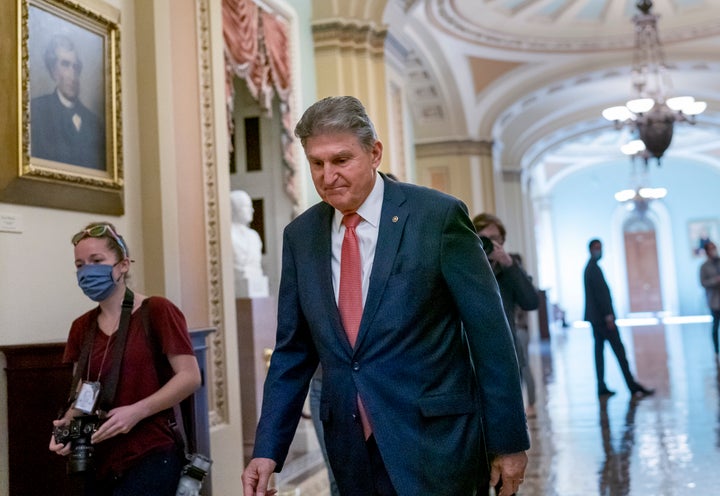 Sen. Joe Manchin (D-W.Va.), seen Friday, was slammed as going back on his word.