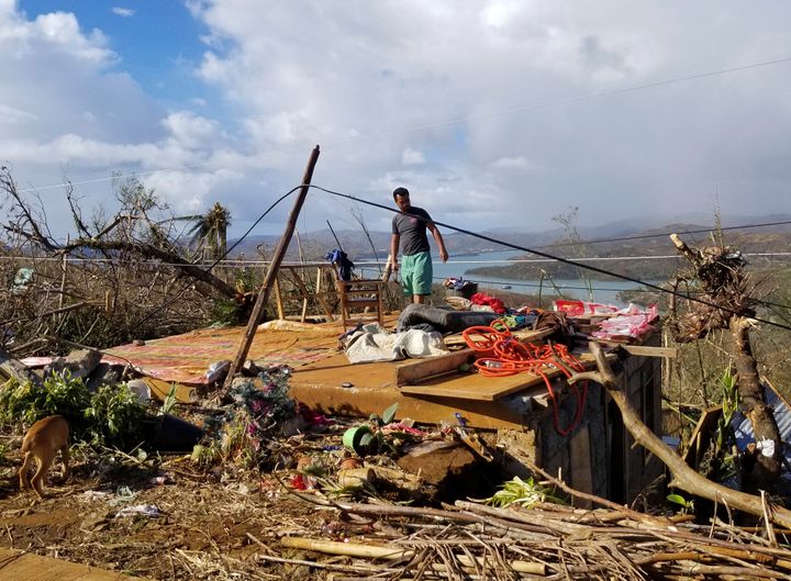 A man's home in the Dinagat islands, southern Philippines, was destroyed by Typhoon Rai, the strongest typhoon to batter the country this year. 