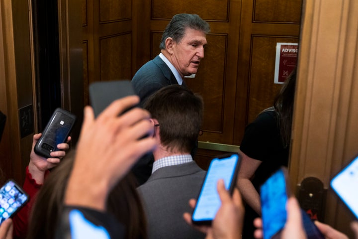 Sen. Joe Manchin (D-W.Va.), talks with reporters in the U.S. Capitol on Wednesday, Dec. 15.