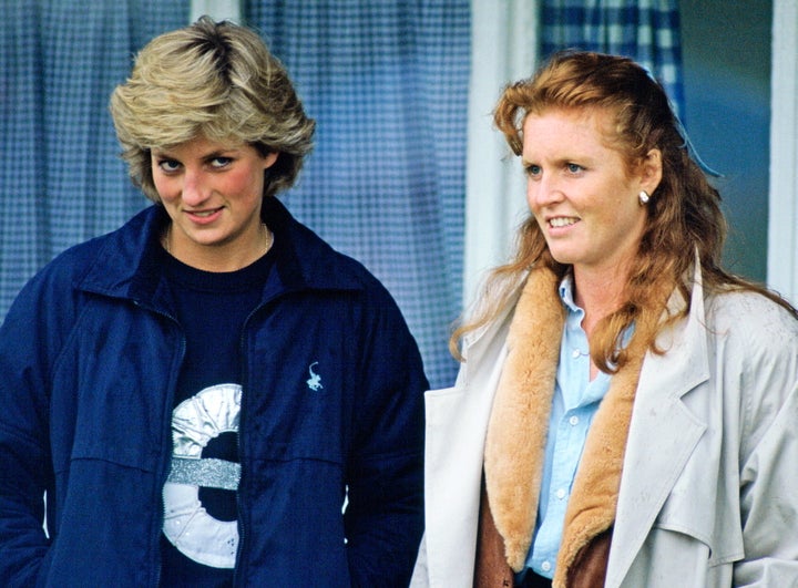 Princess Diana and Sarah, Duchess of York, watching a polo match together.