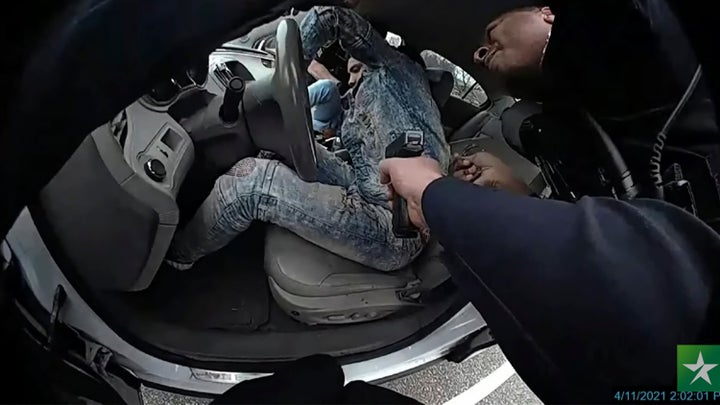 Police body cam video shows Daunte Wright, seated, during a traffic stop on April 11, 2021.