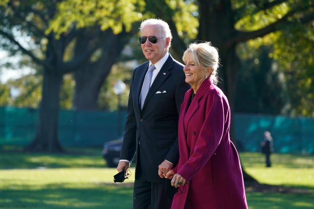 President Joe Biden and first lady Jill Biden arrive on the South Lawn of the White House after spending the weekend in Rehoboth Beach, Del., Monday, Nov. 8, 2021, in Washington. (AP Photo/Evan Vucci)