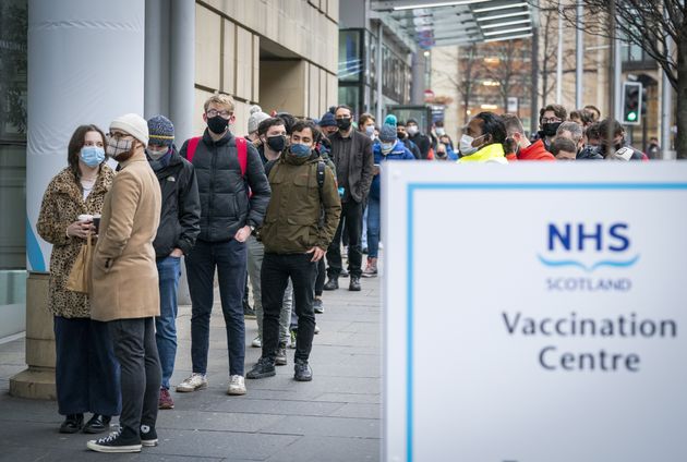 <strong>People queue outside the Edinburgh International Conference Centre (EICC) for the NHS Scotland vaccination centre.</strong>” data-caption=”<strong>People queue outside the Edinburgh International Conference Centre (EICC) for the NHS Scotland vaccination centre.</strong>” data-rich-caption=”<strong>People queue outside the Edinburgh International Conference Centre (EICC) for the NHS Scotland vaccination centre.</strong>” data-credit=”Jane Barlow via PA Wire/PA Images” data-credit-link-back=”” /></p>
<div class=