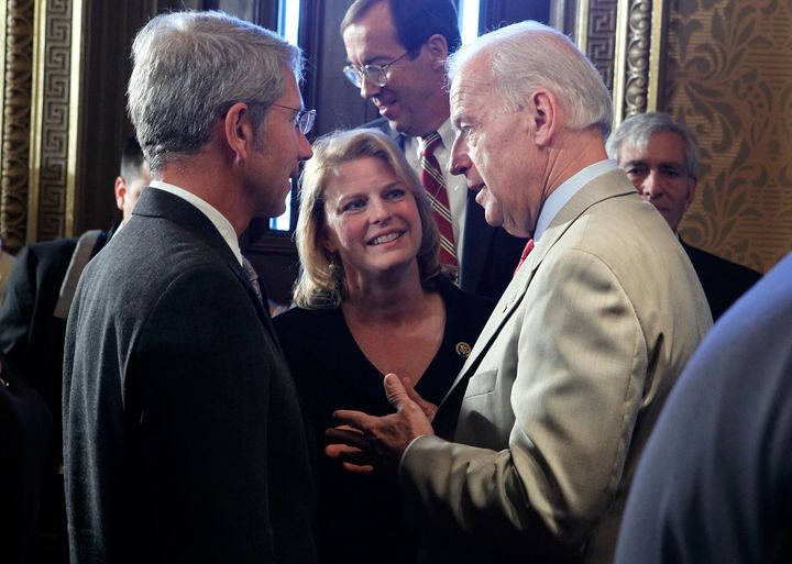 Schrader (left) greets then-Vice President Joe Biden in June 2010. McLeod-Skinner hopes Democratic voters want a representative who is ideologically closer to Biden.