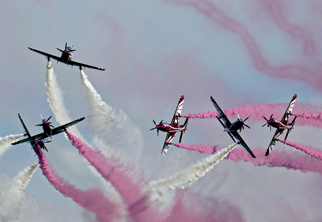 An aerobatics team performs over Qatar's capital Doha as the Gulf state marks its National Day on Saturday. Qatar annually on Dec. 18 marks the anniversary of the unification of the country's tribes in 1878, also known as its "Founder's Day."