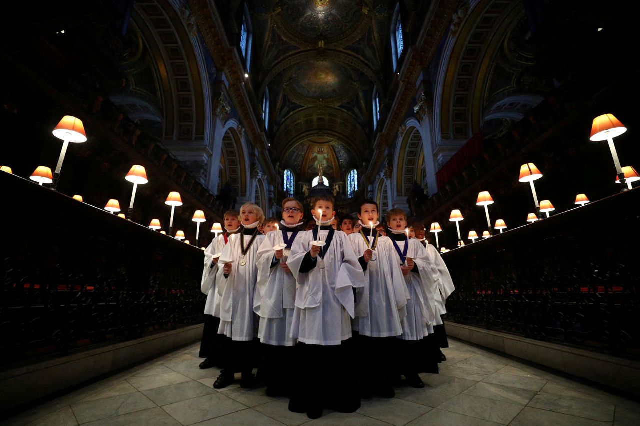 Choristers from St Paul's Cathedral choir take part in a rehearsal photocall at the cathedral in London, Britain, on Tuesday. 