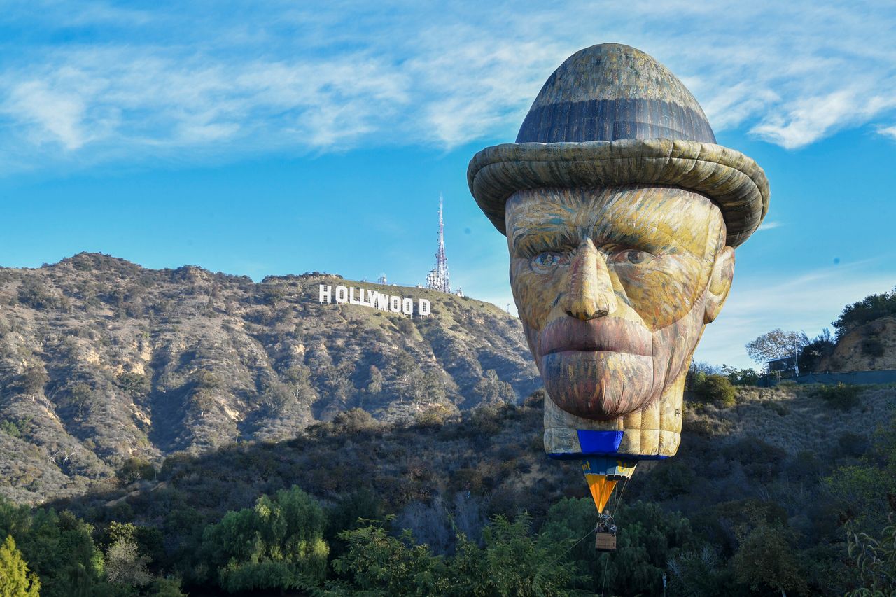 Lighthouse Immersive's 92-foot-tall Vincent Van Gogh-shaped hot air balloon is launched at Lake Hollywood Park on Monday in Los Angeles, California.