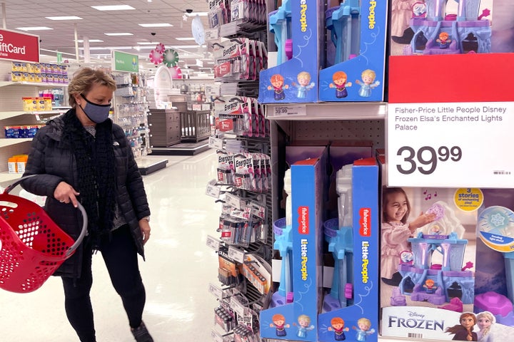 A shopper shops at a retail store in Glenview, Ill., Thursday, Dec. 16, 2021. (AP Photo/Nam Y. Huh, File)