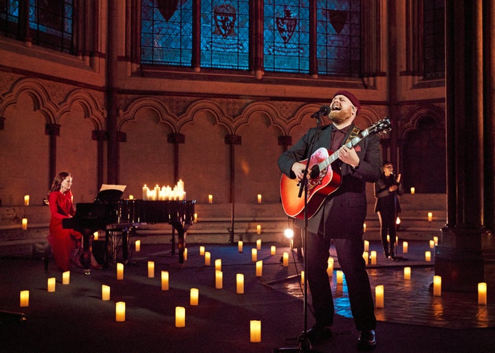 Tom Walker and Duchess of Cambridge perform at a Christmas carol concert hosted by Kate at Westminster Abbey in London.