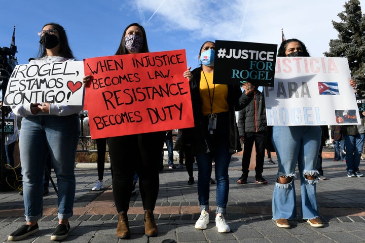 Protestors gather at a rally for truck driver Rogel Aguilera-Mederos outside the Colorado state capitol on Dec. 22. 